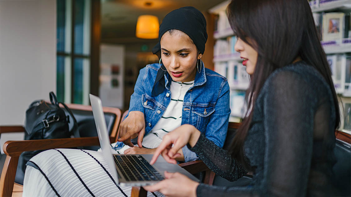 pexels-mentatdgt-1569076_1125x631 Two women looking at laptop